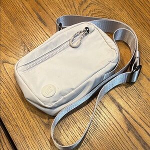 Vuori Cream Crossbody Bag with Silver Accents